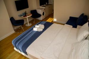 Postel nebo postele na pokoji v ubytování VIP APARTmENTS N9