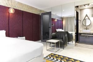Postel nebo postele na pokoji v ubytování Wonju May hotel