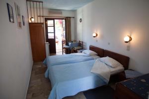 Letto o letti in una camera di Nefeli Hotel