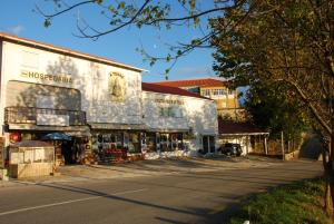 a building on the side of a street at A TORRE no Sabugueiro in Sabugueiro