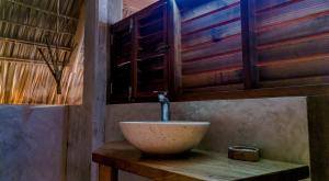 a bathroom with a bowl sink on a wooden table at Casa Paraiso Mazunte - Ocean View Lofts - 1 Min Walk to Rinconcito Beach - Fast Wifi Starlink in Mazunte +31 photos