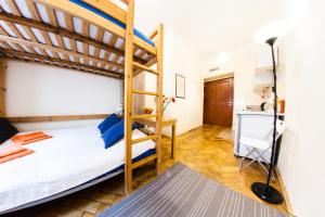 Posteľ alebo postele v izbe v ubytovaní Homely Apartment's Old Town