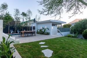 Aed väljaspool majutusasutust Boutique Coastal Retreat