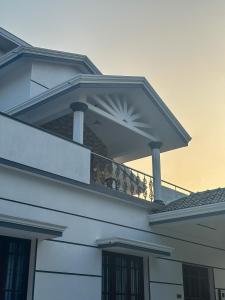 a balcony on the side of a house at 4bhk Luxury Villa in Mangalore