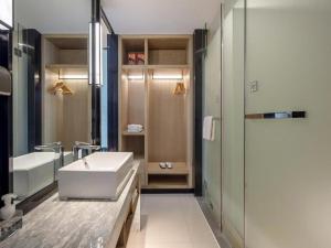 Φωτογραφία από το άλμπουμ του Echarm Hotel Baise Sports Center Dream Island Plaza σε Qitang