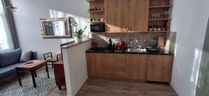 Kuchyňa alebo kuchynka v ubytovaní M37 Apartman