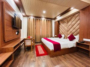 Postelja oz. postelje v sobi nastanitve Yog Maya Regency B&B
