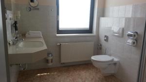 Koupelna v ubytování Teichhotel