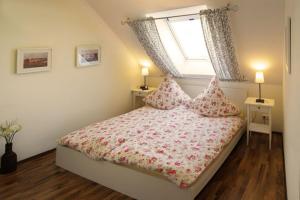 Katil atau katil-katil dalam bilik di 03 Sommerhus Bornholm OG An der Reiterkoppel 3a
