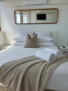 Uma cama ou camas num quarto em Sandbox Mooloolaba Beach