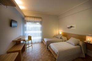 TV a/nebo společenská místnost v ubytování Ciauru Design B&B