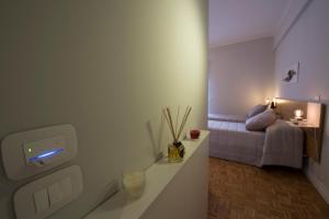 Postel nebo postele na pokoji v ubytování Ciauru Design B&B