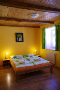 Posteľ alebo postele v izbe v ubytovaní Ubytování a apartmány Sluníčko