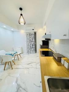 Kuchyň nebo kuchyňský kout v ubytování Limoni Inn Messina
