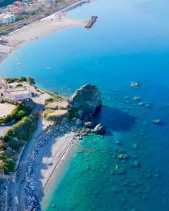 an aerial view of a beach and the ocean at Marica House Spiaggia Coreca Amantea in Amantea