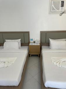 Postel nebo postele na pokoji v ubytování HOTEL the MIR