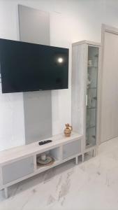 Μια τηλεόραση ή/και κέντρο ψυχαγωγίας στο Apartamento SOLDOYES +14 φωτογραφίες
