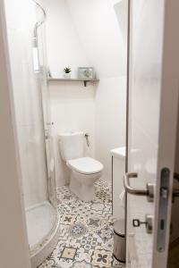 Kúpeľňa v ubytovaní Adeline Apartman