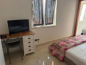 TV a/nebo společenská místnost v ubytování Hotel VistaMare