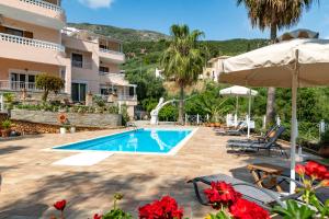 a view of the swimming pool at a resort at Golden Sun in Parga