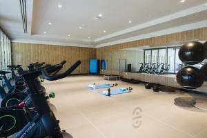 a gym with a lot of exercise equipment in a room at BANCAL HOTEL and SPA in San Sebastián de la Gomera