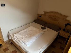 Postel nebo postele na pokoji v ubytování Hotel 2000