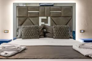 Postel nebo postele na pokoji v ubytování D'ossuna66 Classic