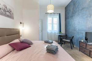 Ένα ή περισσότερα κρεβάτια σε δωμάτιο στο Casa Luna