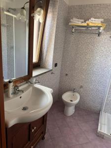 Koupelna v ubytování Hotel VistaMare