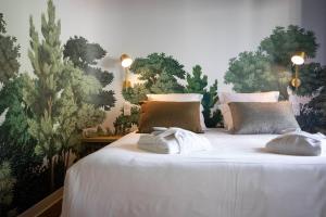 Postel nebo postele na pokoji v ubytování Lykke Hotel & Spa Chamonix - ex Mercure