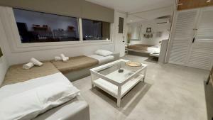 Postel nebo postele na pokoji v ubytování Mykonos Seaview Nests - Tourlos Getaways
