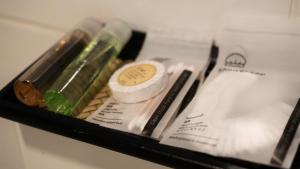 a drawer filled with different types of tooth brushes at Pas Cher Hotel de Bangkok in Bangkok