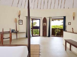 Posezení v ubytování Movenpick Resort Lamantin Saly
