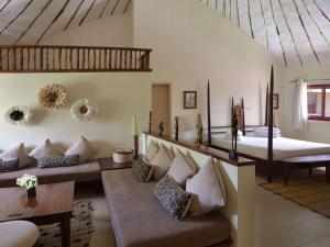 Postel nebo postele na pokoji v ubytování Movenpick Resort Lamantin Saly