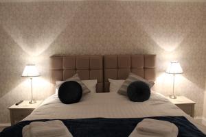 Säng eller sängar i ett rum på Shandon Farmhouse Bed and Breakfast