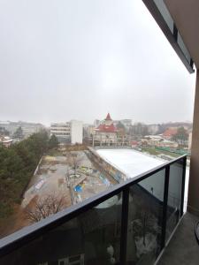 a view from the balcony of a building at Ultracentral 4Bedroom with 2 Bathrooms Cozy Apartment in Suceava in Suceava
