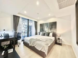 Ένα ή περισσότερα κρεβάτια σε δωμάτιο στο Circle Sukhumvit 11 Bangkok