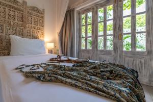 Katil atau katil-katil dalam bilik di Nomad Beach Resort