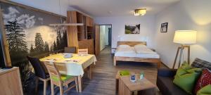 Postel nebo postele na pokoji v ubytování Montana Haus, Fewo A14, A17, B4 oder C8