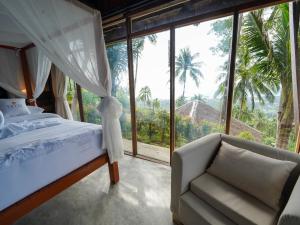 RoomQuest THEVA Resort Koh Samui客房内的一张或多张床位