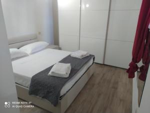 En eller flere senge i et værelse på Il Brigante