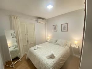 Postel nebo postele na pokoji v ubytování Sánchez Home, Pleno Centro