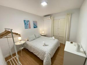 Postel nebo postele na pokoji v ubytování Sánchez Home, Pleno Centro