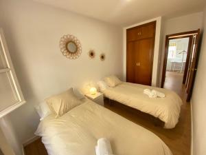 Postel nebo postele na pokoji v ubytování Sánchez Home, Pleno Centro