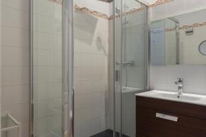 Kúpeľňa v ubytovaní AB Casanova Apartment + 15 fotografií