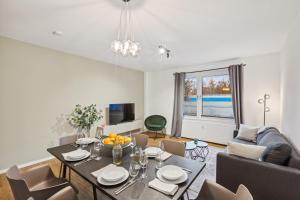 Ruang duduk di Apartment Kranich mit 3 Zimmern, top Infrastrukturlage HH Langenhorn, nähe Airport, Boxspringbetten und Arbeitsplätzen mit Glasfaser WLAN