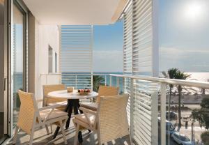 A balcony or terrace at Pure Salt Residences