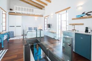A kitchen or kitchenette at kito- transformed house on the water's edge