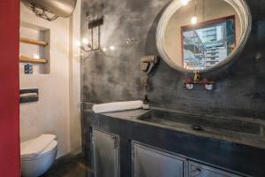 A bathroom at kito- transformed house on the water's edge