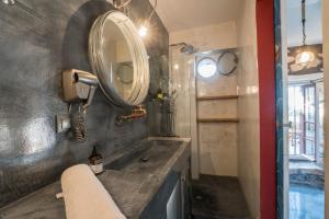 A bathroom at kito- transformed house on the water's edge